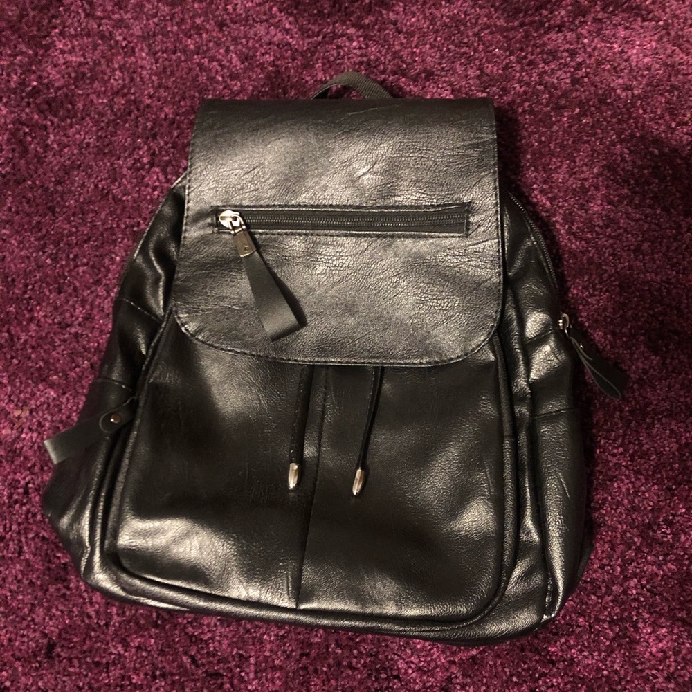NWOT Black Backpack